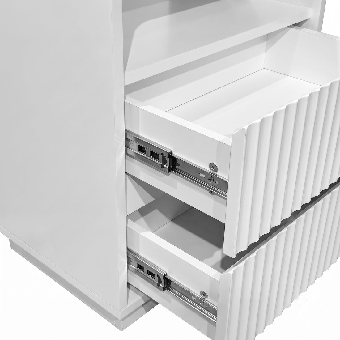Close-up of the side of a white cabinet showing partially open drawers and metal drawer slides.
