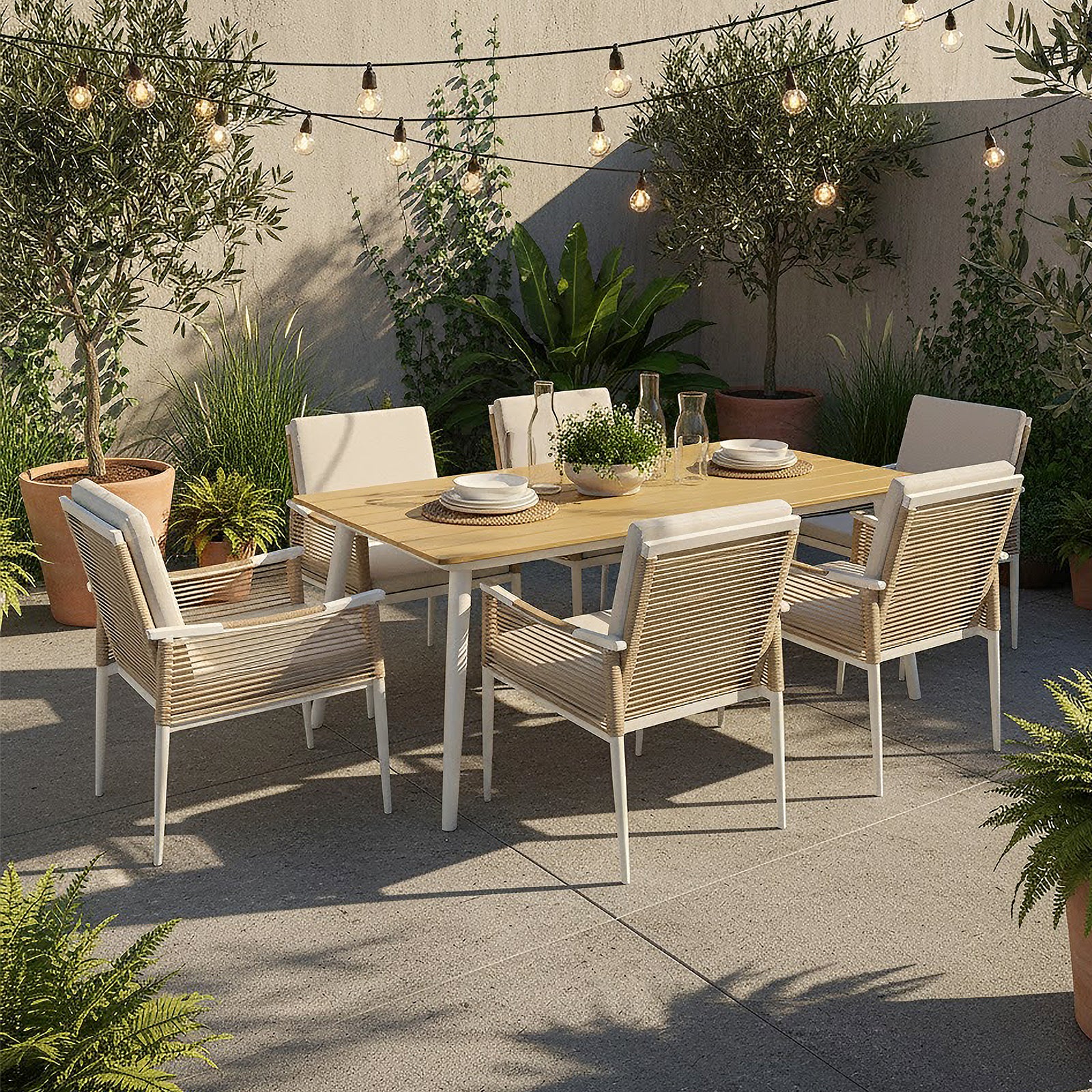 Casara 7 Piece Outdoor Dining Set featuring a light-wood table and six rope-wrapped armchairs with cushions, surrounded by potted plants and string lights, creating a serene al fresco dining ambiance.