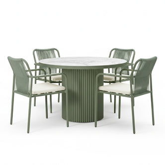 Evone 4 Seater Stone Outdoor Dining Table Set in Green, featuring a round marble-look tabletop and fluted base, with four metal-framed chairs with woven backs and white cushions.