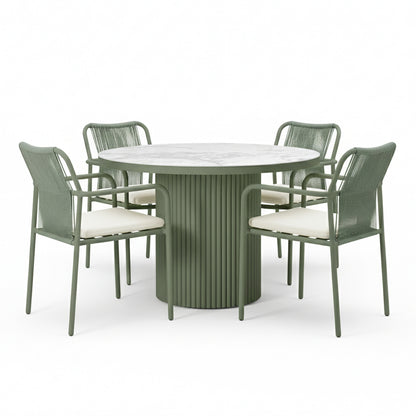 Evone 4 Seater Stone Outdoor Dining Table Set in Green, featuring a round marble-look tabletop and fluted base, with four metal-framed chairs with woven backs and white cushions.