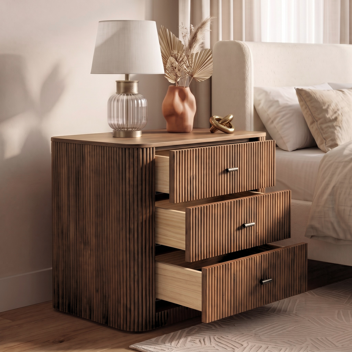 Wooden nightstand with partially open drawers in a styled bedroom