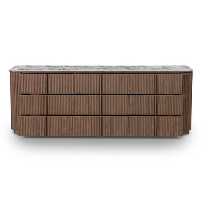 Contemporary sideboard with fluted wood design and marble top on white background