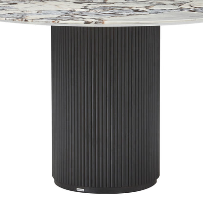 Gracie 120cm Round Marble Dining Table in Black features a white marble top with unique veining and a cylindrical, vertically-fluted black base, showcasing timeless elegance and sturdy design.