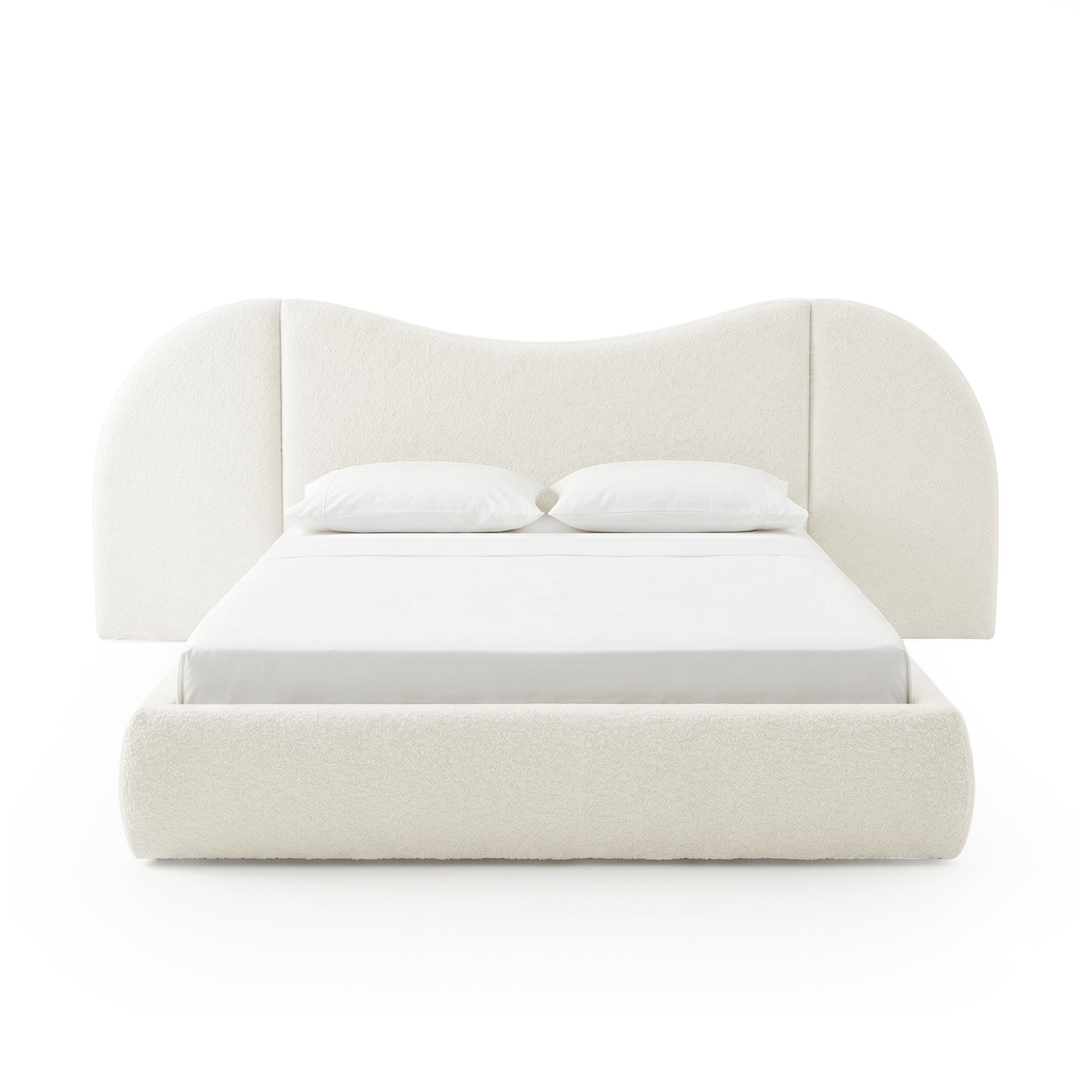 Contemporary upholstered bed with sculpted headboard on white background