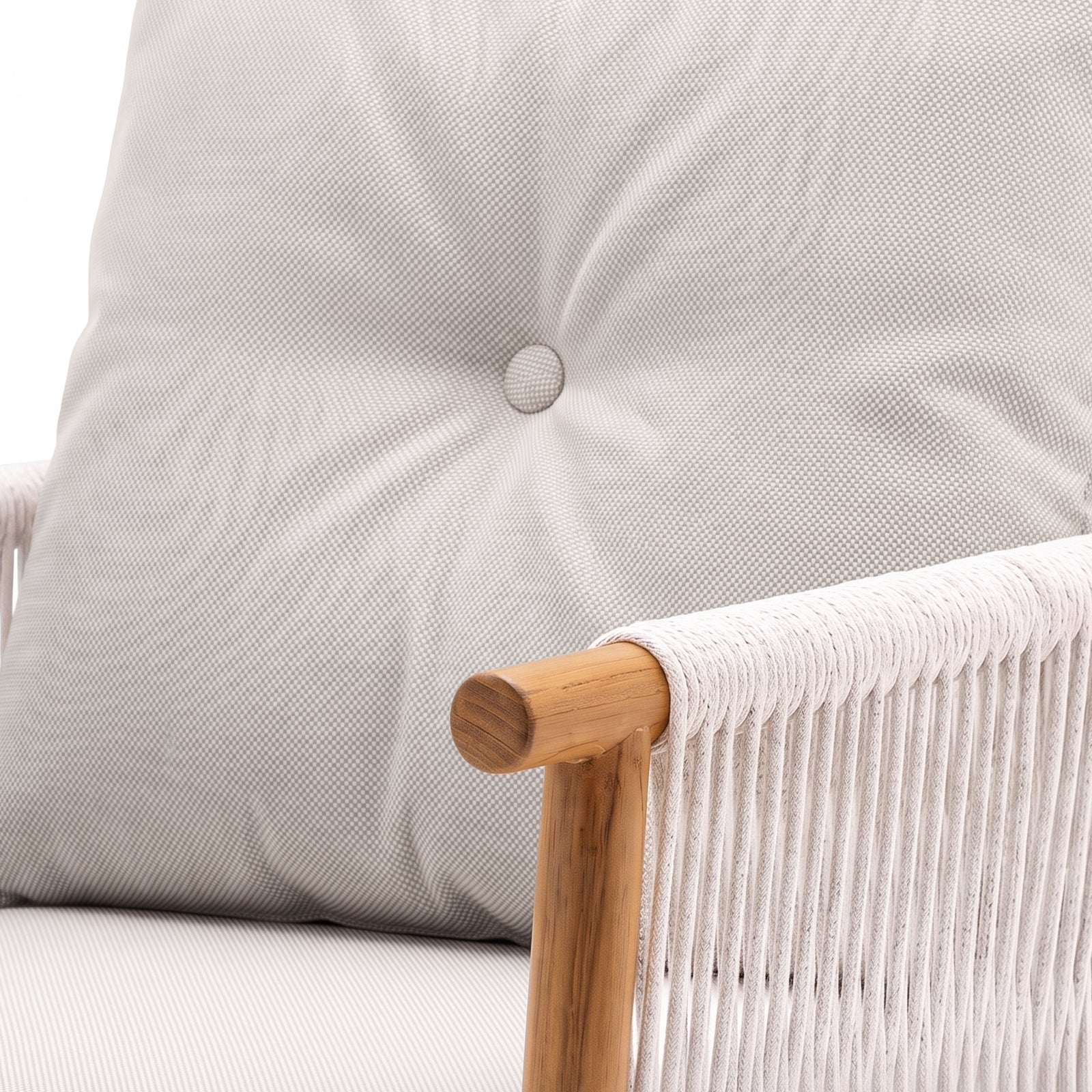 Close-up of a modern chair armrest, cushion, and woven rope back detail on a white background