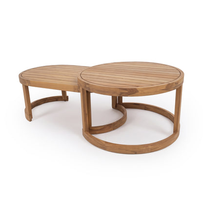 Two nested round wooden coffee tables on a white background