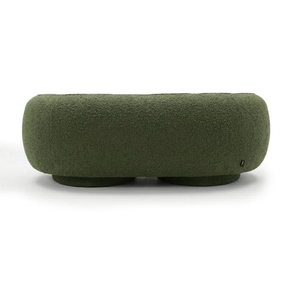 Green rounded ottoman on white background