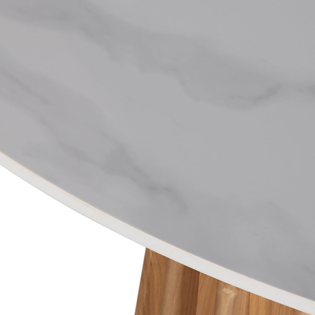 Close-up of the Gabi 120cm Marble Look Dining Table in Oak, featuring a white, veined marble-style tabletop on a fluted wooden pedestal, ideal for compact dining spaces.