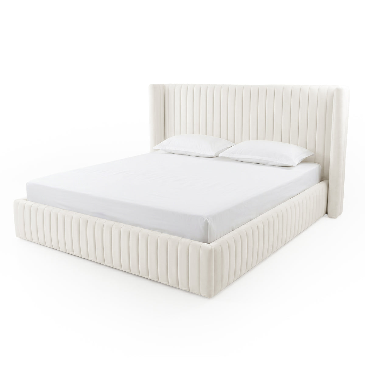 Three-quarter view of a cream upholstered bed with vertical channel detailing