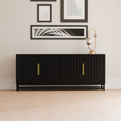 Black sideboard in room setting with framed art and lamp