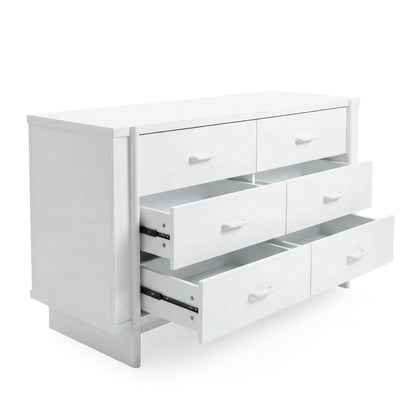White dresser on white background with drawers partially pulled out