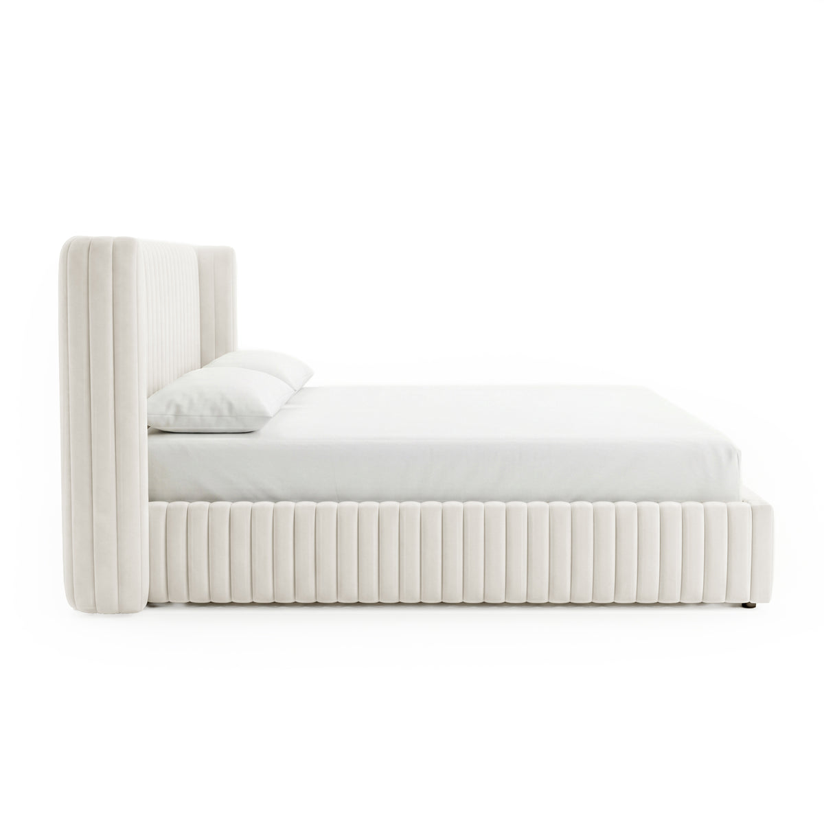 Side view of a cream upholstered platform bed with tall headboard