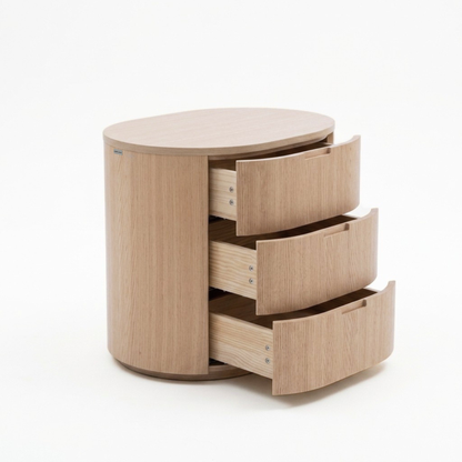 Light wood oval storage cabinet with partially open drawers on a white background