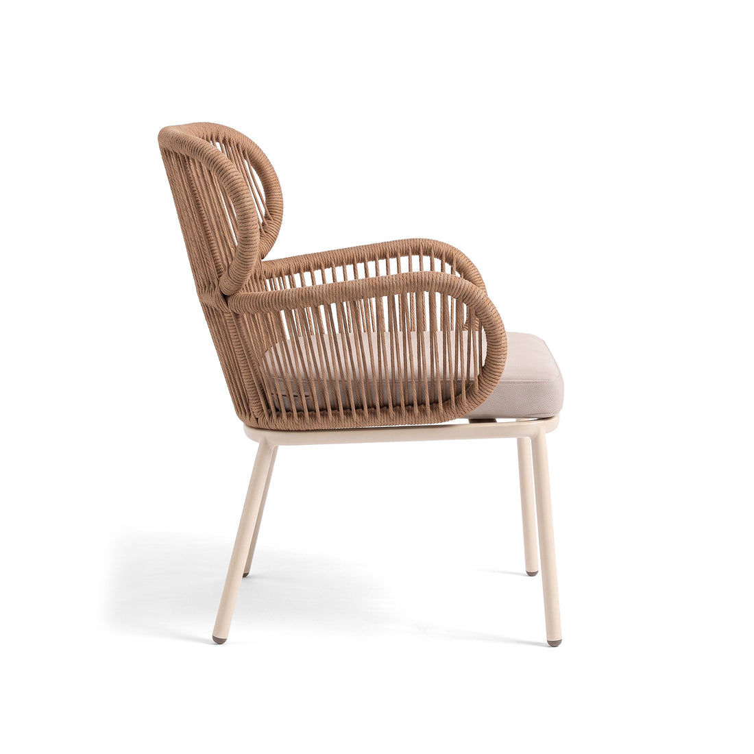 Side view of a woven armchair on a white background