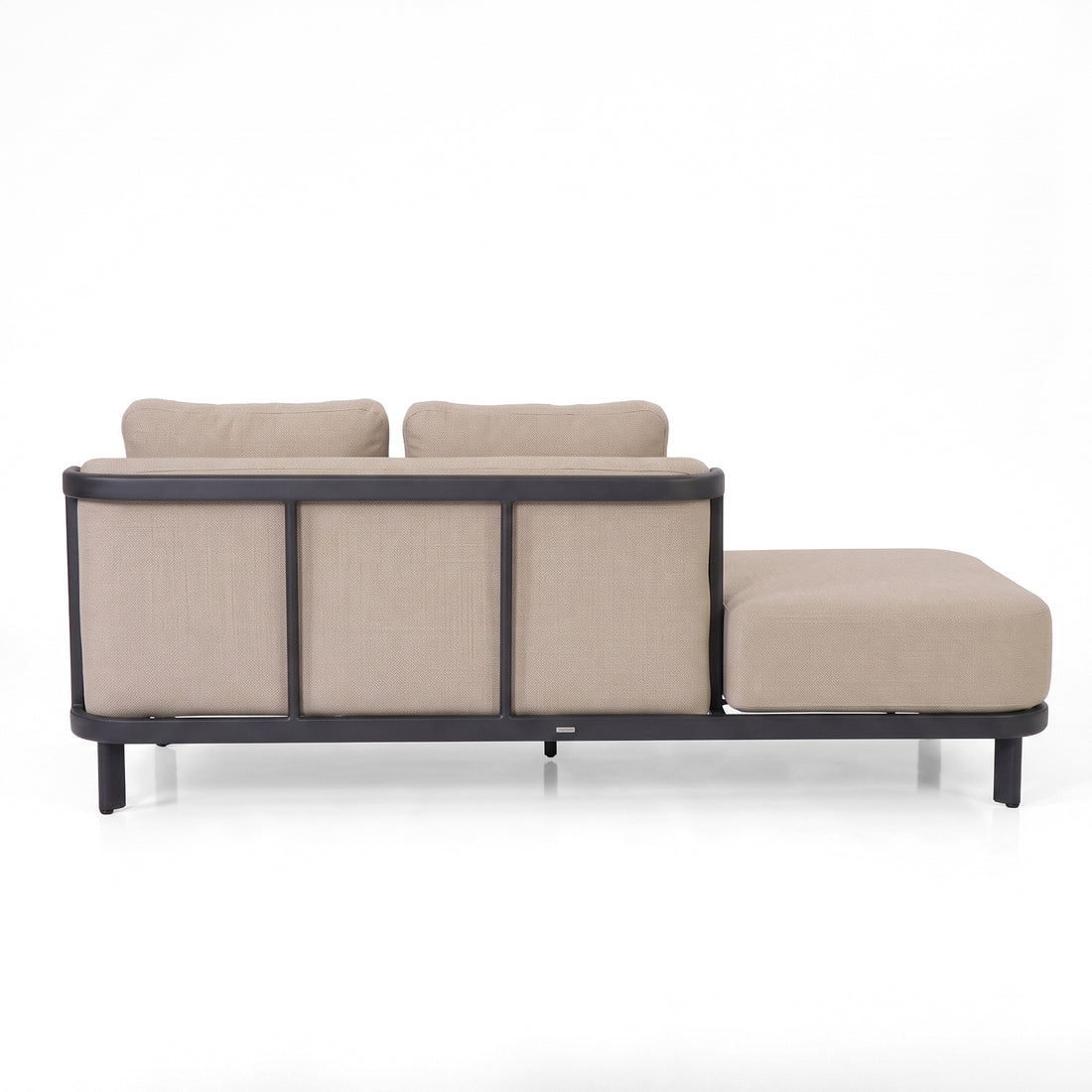 Back view of a beige sectional sofa on white background.