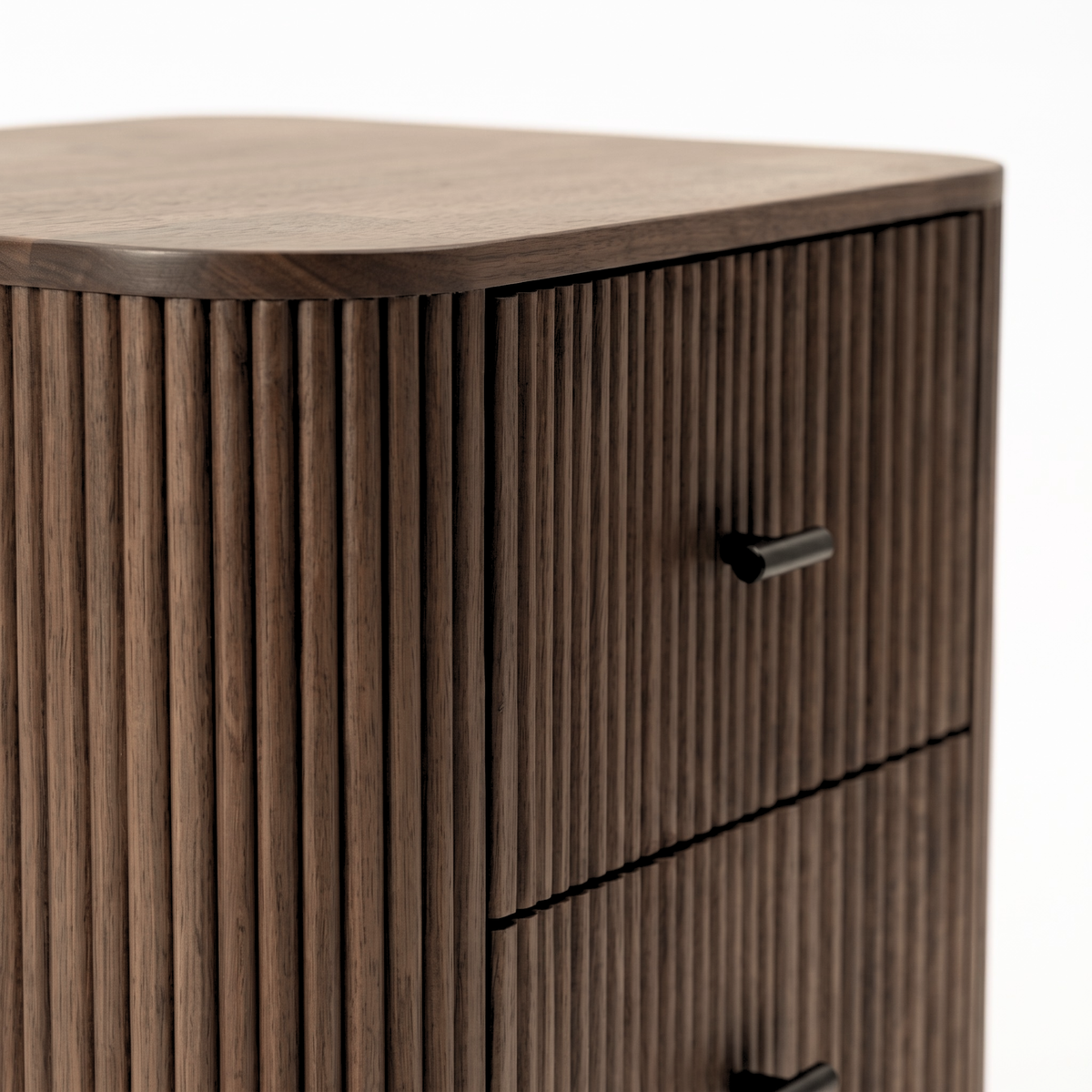 Close-up partial view of a wooden chest with vertical slats on a white background