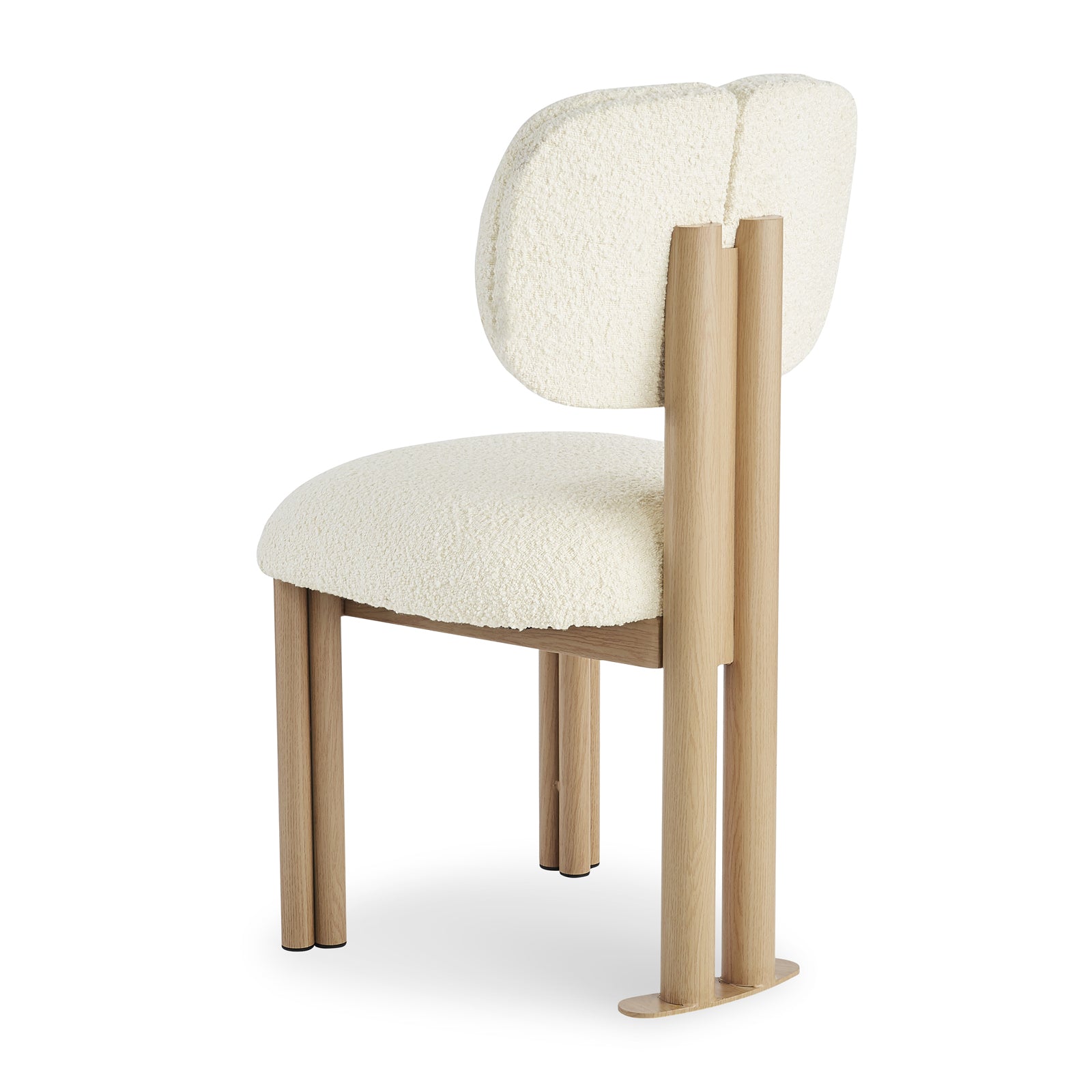 Norii Boucle Fabric Dining Chair in Cream White features a curved, upholstered seat and back in boucle fabric with light-finished wood frame and distinct double rear support posts for an architectural aesthetic.