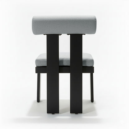 Positano 6 Seater Outdoor Dining Set in Black & Grey features a minimalist chair with light-gray upholstered seat and backrest on a sleek black metal frame, emphasizing modern design.