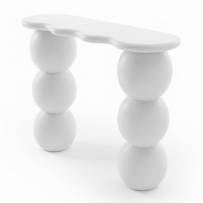 White sculptural console table with wavy top and three stacked sphere legs on white background