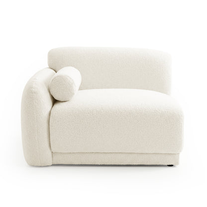 Armless accent chair with bolster pillow on white background