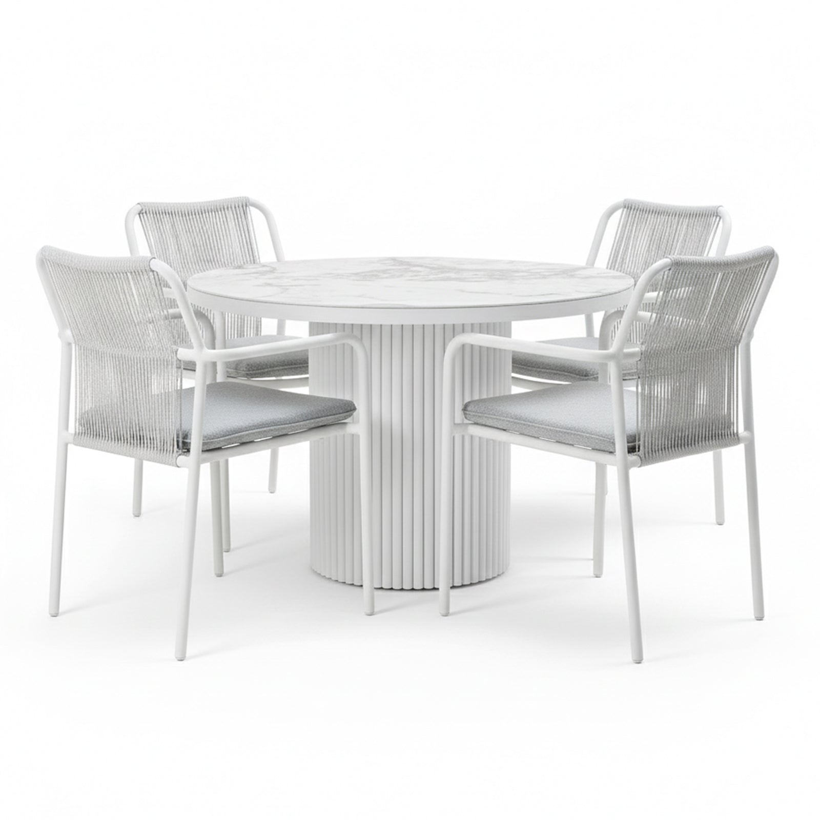 Evone 4 Seater Stone Outdoor Dining Table Set in Light Grey; round table with marble-patterned top, fluted pedestal base, surrounded by four chairs featuring woven backs and gray cushions.
