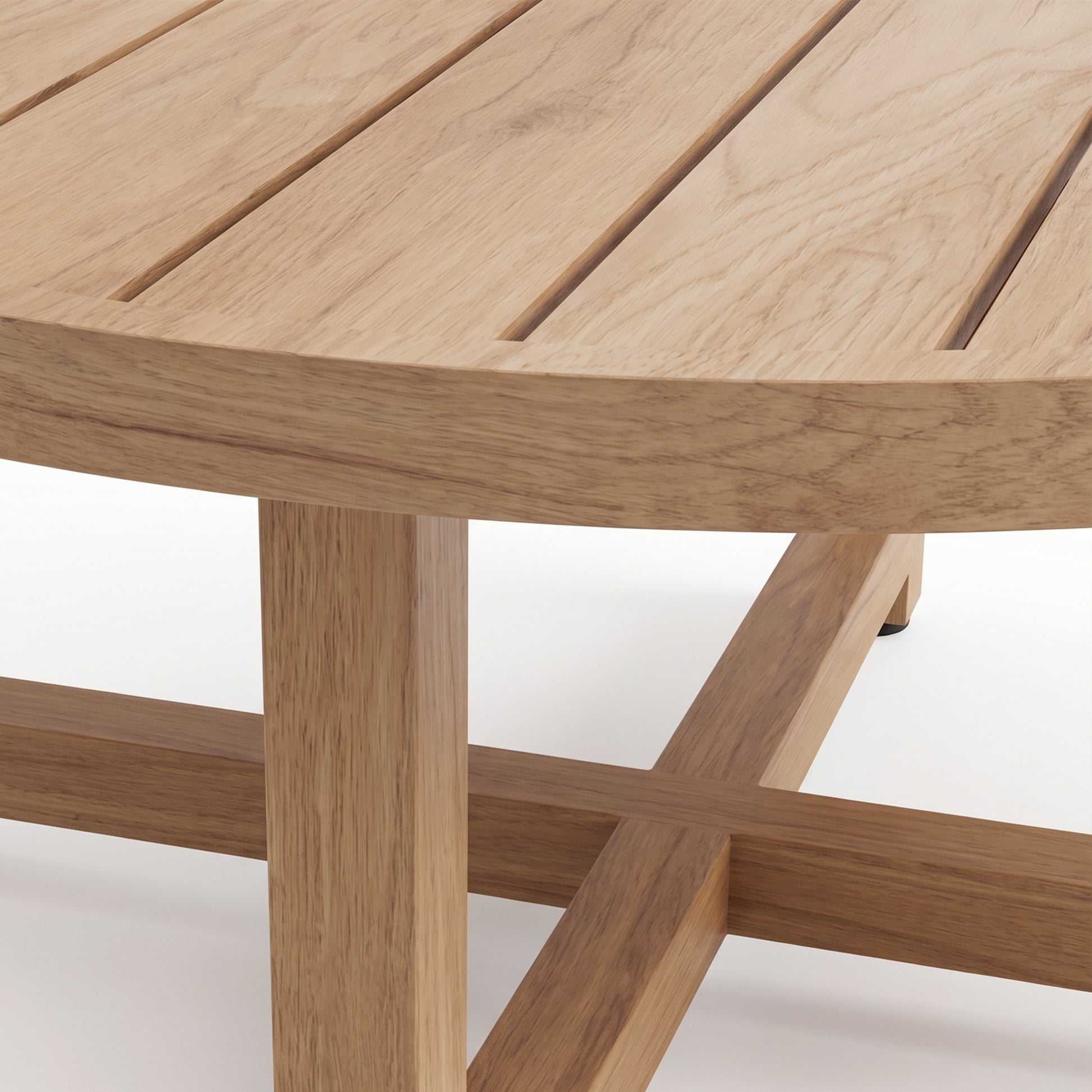 Close-up of a round wooden table corner with slatted top and intersecting legs