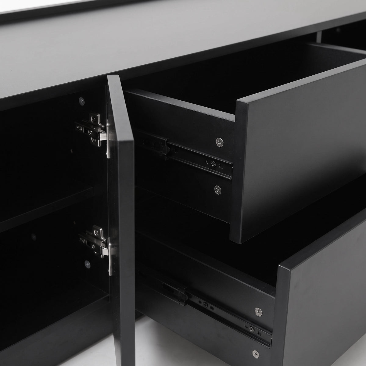 Close-up of black cabinet drawers and hardware