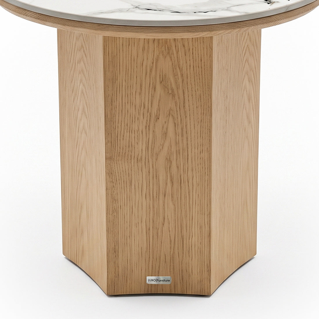 Close-up of the wooden base and lower portion of a round marble-topped table on white background