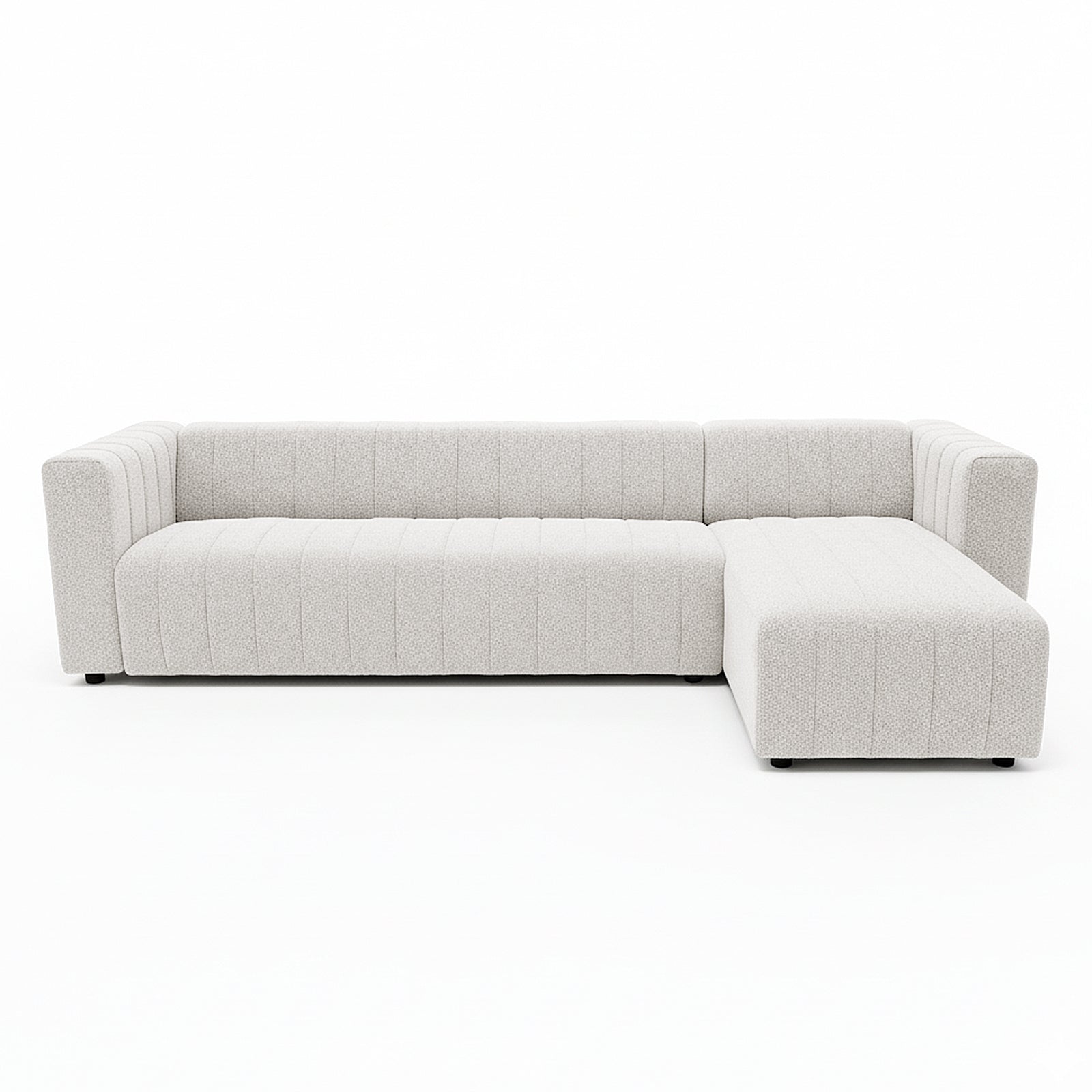 Parisa 4 Seater Tufted Boucle Sofa with Chaise in Cream White features an L-shaped design, clean squared-off arms, low black feet, and a right-side chaise, showcasing a modern, textured aesthetic.