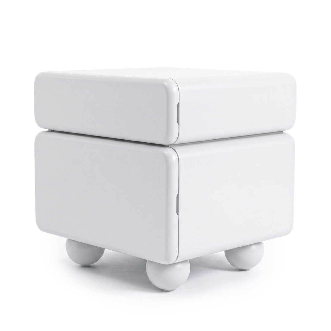 Modern white cubic side table with rounded corners and spherical feet on white background