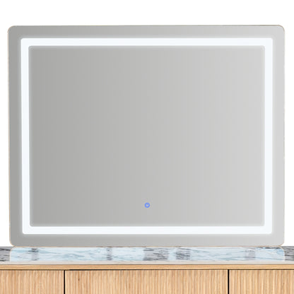 Rectangular LED mirror mounted above a vanity with countertop visible