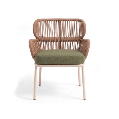 Modern woven chair with green cushion on a white background