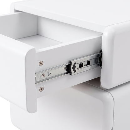 Close-up of a white drawer with metal sliding rail