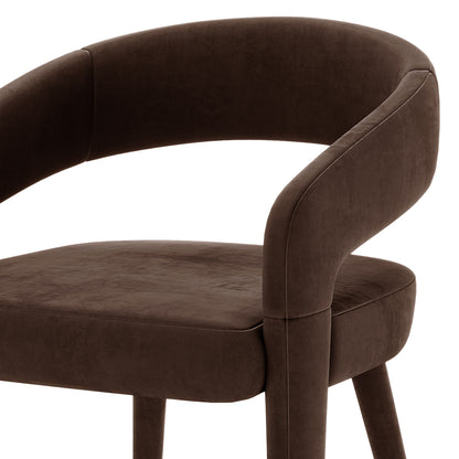 Eisha Velvet Dining Chair Set of 2 in Deep Mocha Brown features a modern design with a curved backrest, low armrests, padded seat, and sleek, upholstered legs, offering luxurious dining comfort.