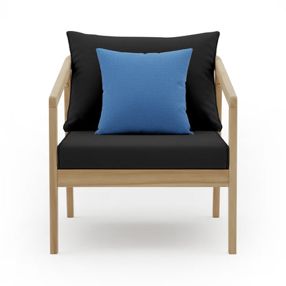 Delva 4 Seater Hardwood Acacia Outdoor Sofa Set in Black, featuring a light-wood frame armchair with black cushions and a blue throw pillow, set against a simple white background.