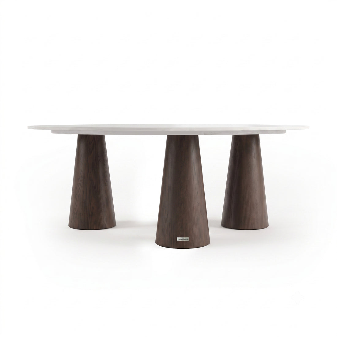 Modern oval table with white top and three dark pedestal legs on a white background