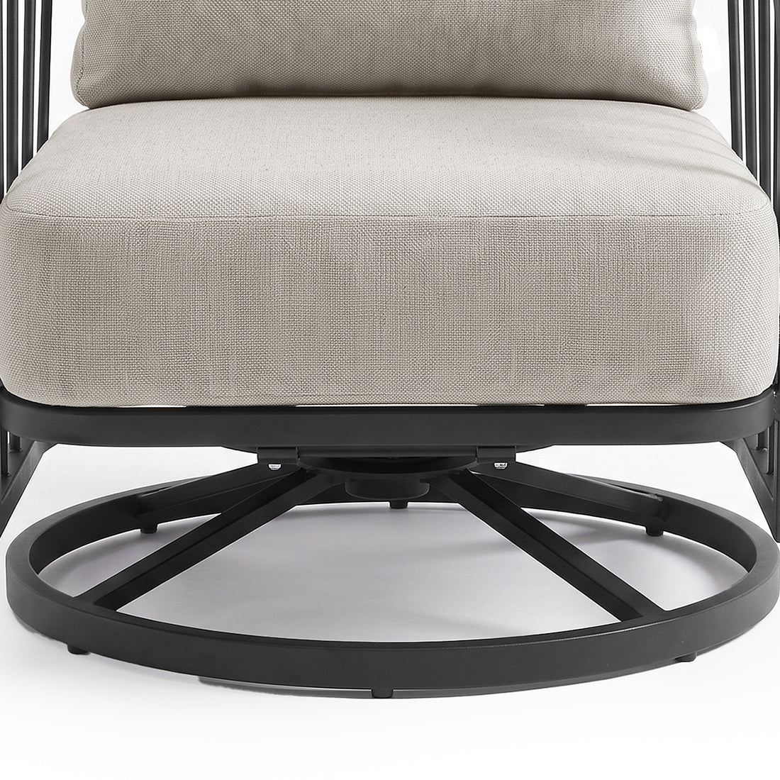 Close-up partial view of a chair seat and base on a white background