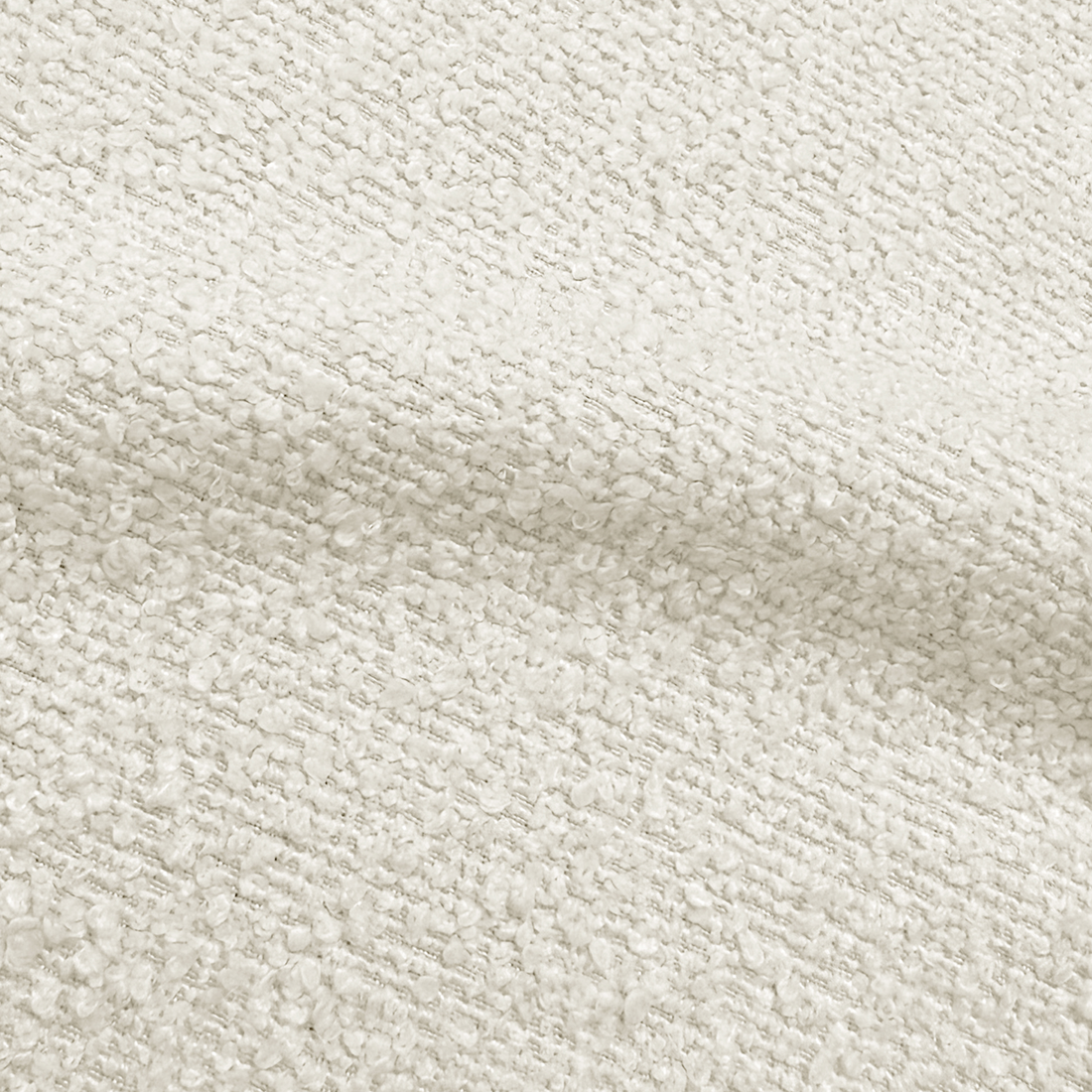 Close-up of cream bouclé upholstery texture