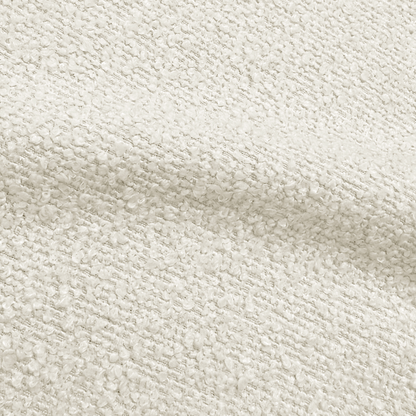 Close-up of cream bouclé upholstery texture