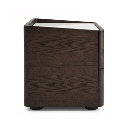 Cube-shaped walnut nightstand with a white top and short round feet on a white background.