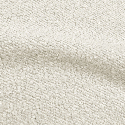 Close-up of off-white boucle fabric texture