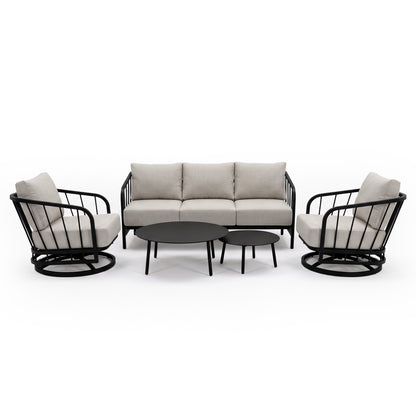 Complete modern seating set with sofa, armchairs, and coffee tables on a white background