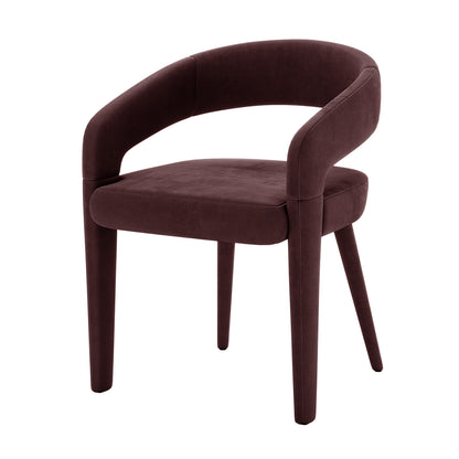 Eisha Velvet Dining Chair Set of 2 in Dark Plum features plush, rounded backrests with integrated armrests, upholstered in rich velvet, supported by sleek, tapered legs, ideal for modern dining spaces.